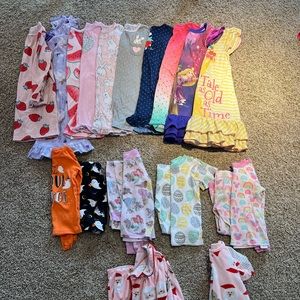 Lot of 16 pairs of girls size 4/5 pajamas.